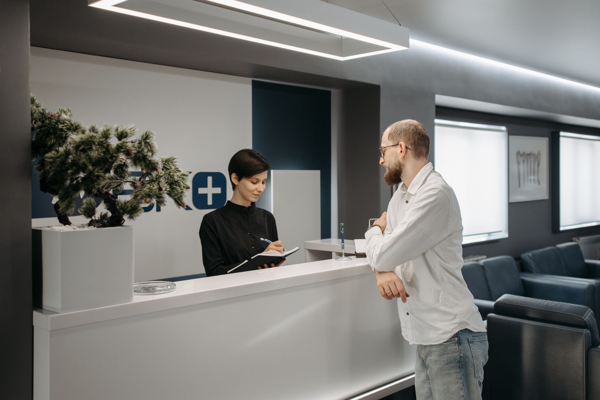 Healthcare clinic office reception desk with a clean, professional aesthetic