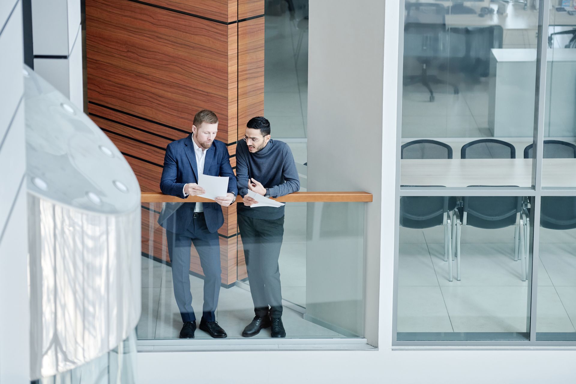Modern professional office meeting room with table and chairs