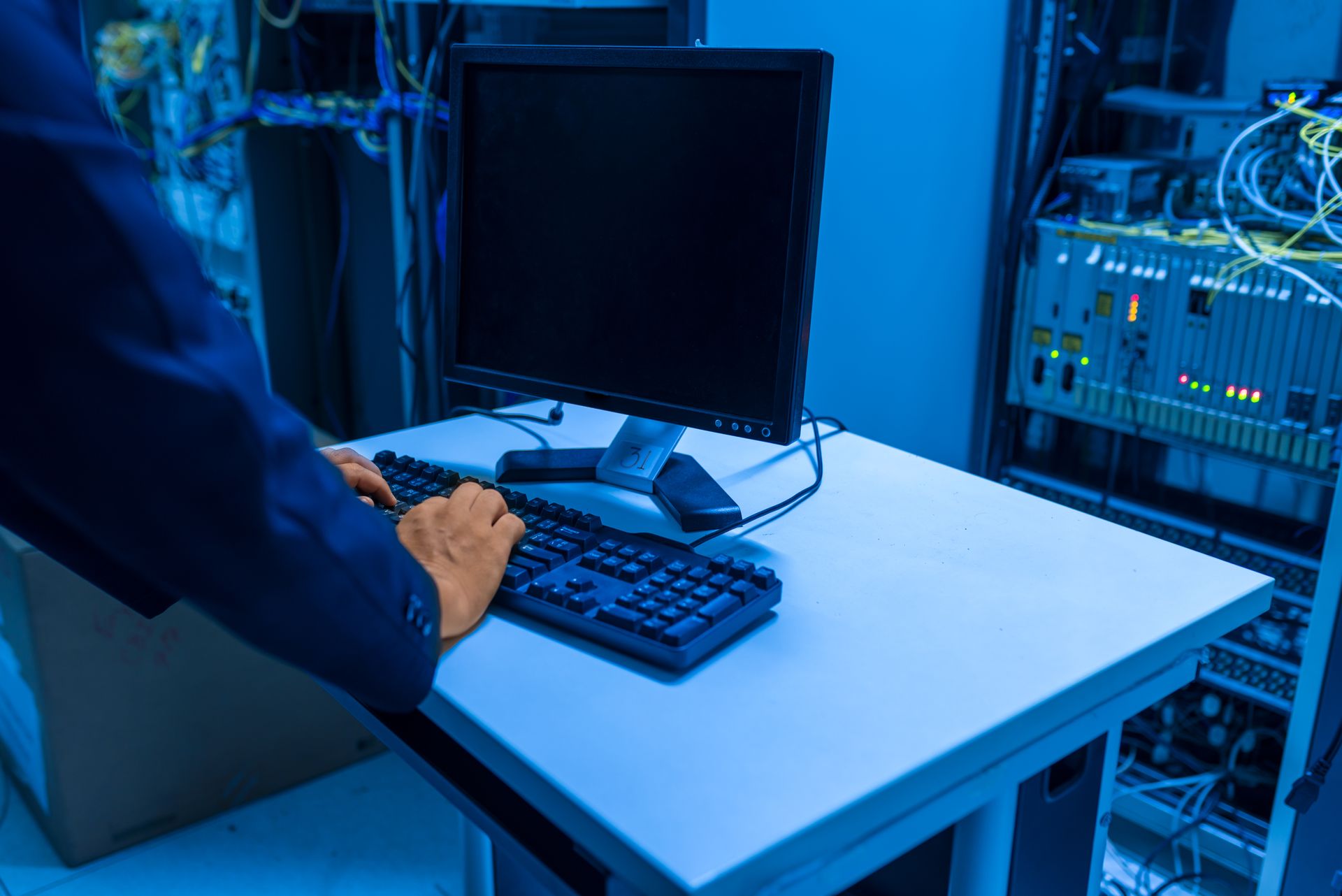 TechniWorx engineer working in a server room